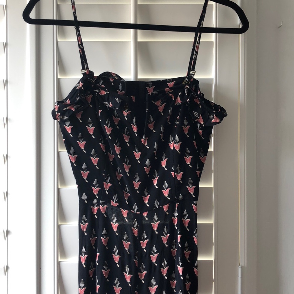 Black with pink flower and white detail jumpsuit